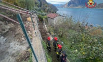 Incidente sul lavoro a Bellano: precipita da un muro mentre guida l'escavatore
